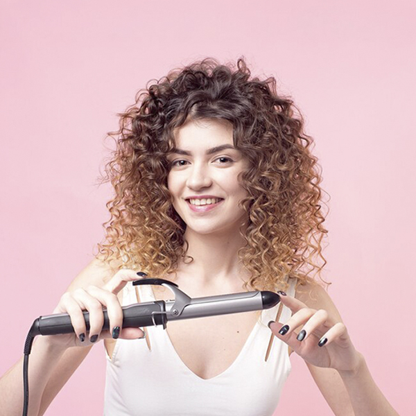 curling with a curling iron